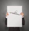 Businessman showing poster of hand drawn airplane Royalty Free Stock Photo