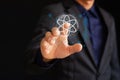 Businessman showing quantum processing icon on virtual screen. Quantum computing. Massive data processing