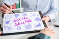 Social selling concept on a clipboard