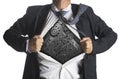 Businessman showing a superhero suit underneath machinery Royalty Free Stock Photo