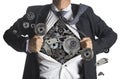 Businessman showing a superhero suit underneath machinery metal Royalty Free Stock Photo