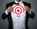 Businessman showing target symbol