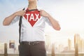 Businessman showing Tax text under his shirt Royalty Free Stock Photo