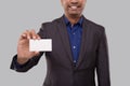 Businessman Showing Visit Card Isolated. Indian Business man blank Card in Hand Royalty Free Stock Photo