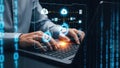 Businessman working on laptop with cloud computing and data security icons Royalty Free Stock Photo
