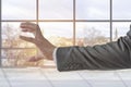 Businessman shows attacking claw hand in the office Royalty Free Stock Photo