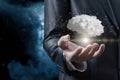 Businessman shows cloud in the form of a brain Royalty Free Stock Photo