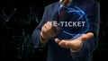 Businessman shows concept hologram E-ticket on his hand