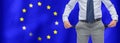 Businessman shows pockets over flag european union