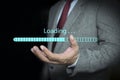 Businessman shows the sign of download application and waiting to loading from online server, Upload, download, internet, network Royalty Free Stock Photo