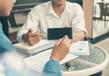 Businessman signing contract with digital pen on mobile phone. man giving electronic signature on smartphone Royalty Free Stock Photo