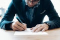 Businessman signing contract making a deal. Royalty Free Stock Photo