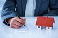 Businessman signing contract for new house Royalty Free Stock Photo