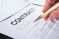 Businessman signing contract paper at desk Royalty Free Stock Photo