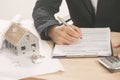 Businessman signing a mortgage contract Royalty Free Stock Photo