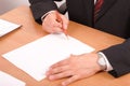 Businessman signing papers Royalty Free Stock Photo