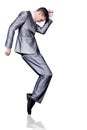 Businessman in silver suit dancing. Isolated.