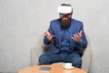 Businessman sit chair wear hmd explore virtual reality or ar. Business partner interact in virtual reality. New