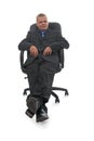 Businessman sitting in armchair Royalty Free Stock Photo