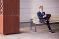 Businessman sitting on bench Royalty Free Stock Photo