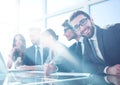 Businessman sitting at a business meeting in the office. Royalty Free Stock Photo