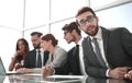 Businessman sitting at a business meeting in the office. Royalty Free Stock Photo