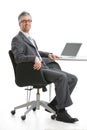 Businessman sitting at desk Royalty Free Stock Photo