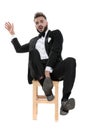 Businessman sitting and leaning back while grabbing the chair scared Royalty Free Stock Photo