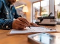 Businessman sitting at office desk signing a contract close up Royalty Free Stock Photo