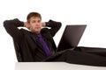 Businessman is sitting relaxed