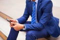 Businessman sitting on stair during callling the phone, with off Royalty Free Stock Photo