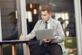 Businessman sitting at thecafe with laptop Royalty Free Stock Photo