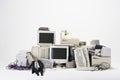 Businessman Sitting By Various Obsolete Technologies