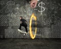 Businessman skating on money skateboard through fire circle with