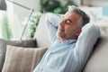 Businessman sleeping on the couch