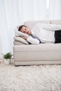 Businessman sleeping on couch after long day Royalty Free Stock Photo