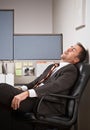 Businessman sleeping at desk