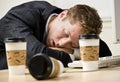 Businessman sleeping at desk