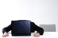 Businessman sleeping on an opened briefcase. Conceptual image shot Royalty Free Stock Photo