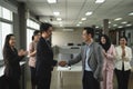 Businessman in smart office suit shaking their hands with partners and secretary team of both sides after successfully negotiated