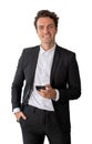 Businessman with smartphone in hand, smiling. Isolated over whit Royalty Free Stock Photo