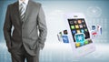 Businessman with smartphones and colorful apps