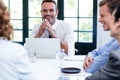 Businessman smiling in a business meeting Royalty Free Stock Photo