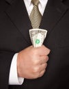 Businessman Squeezing Dollar Bill