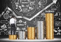 Businessman on stack of coins Royalty Free Stock Photo