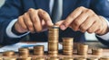 Businessman Stacking Coins Financial Growth