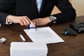 Businessman Stamping Contract Paper