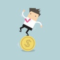 Businessman stand on coin Royalty Free Stock Photo