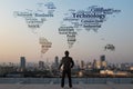 Businessman stand on roof top of skyscraper examine word cloud