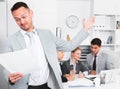Businessman feeling angry to coworkers Royalty Free Stock Photo